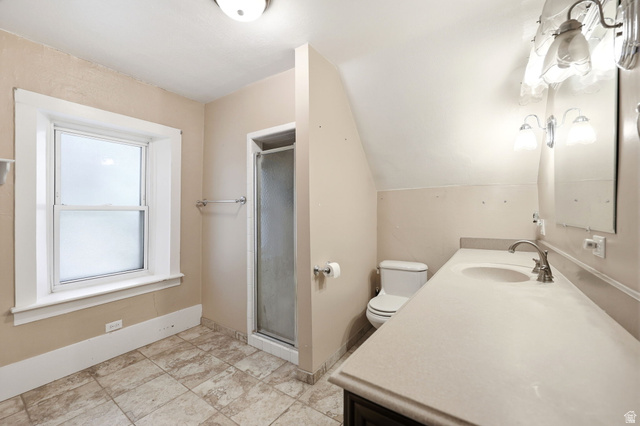 310 South 300 West Payson, UT 84651 - Photo 22 of 42 Bathroom featuring a single window, a glass-enclosed shower, and a vanity with an integrated sink