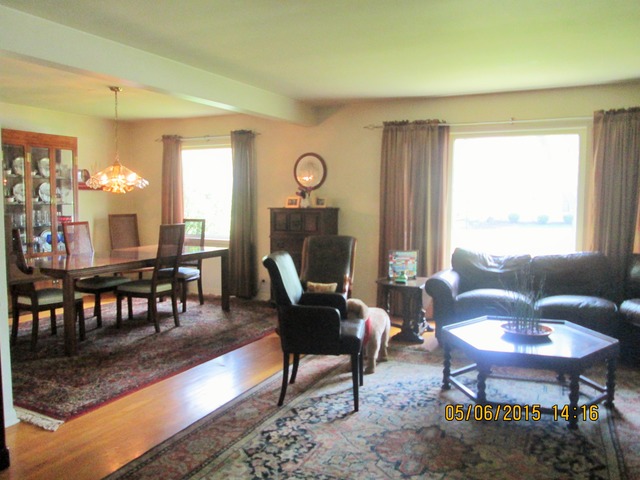 3655 Poplar Road Flossmoor, IL 60422 - Photo 3 of 23 a living room with furniture a table and a large window
