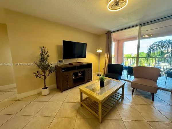 a kitchen with a table and chairs in it