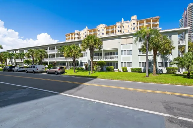a view of street with parked cars