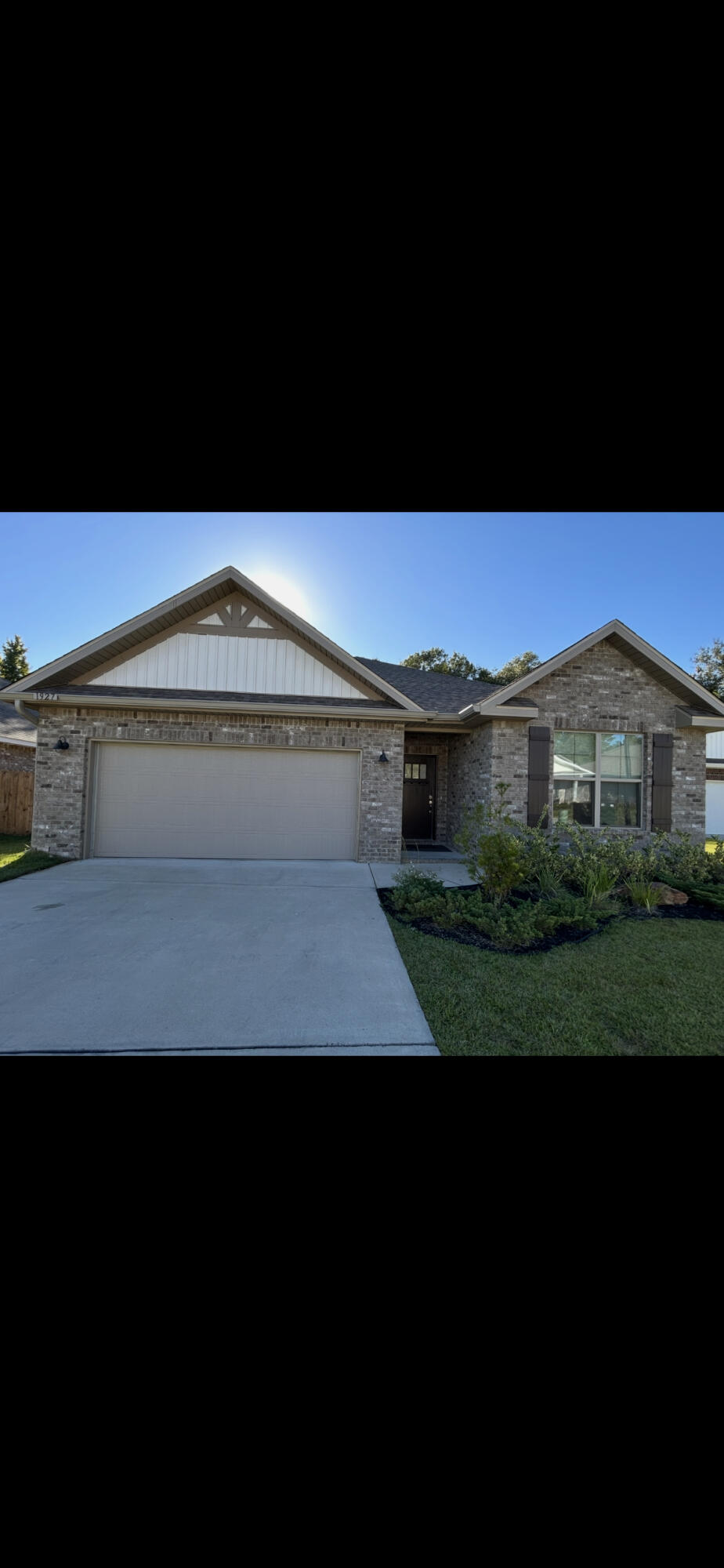 a view of house with yard