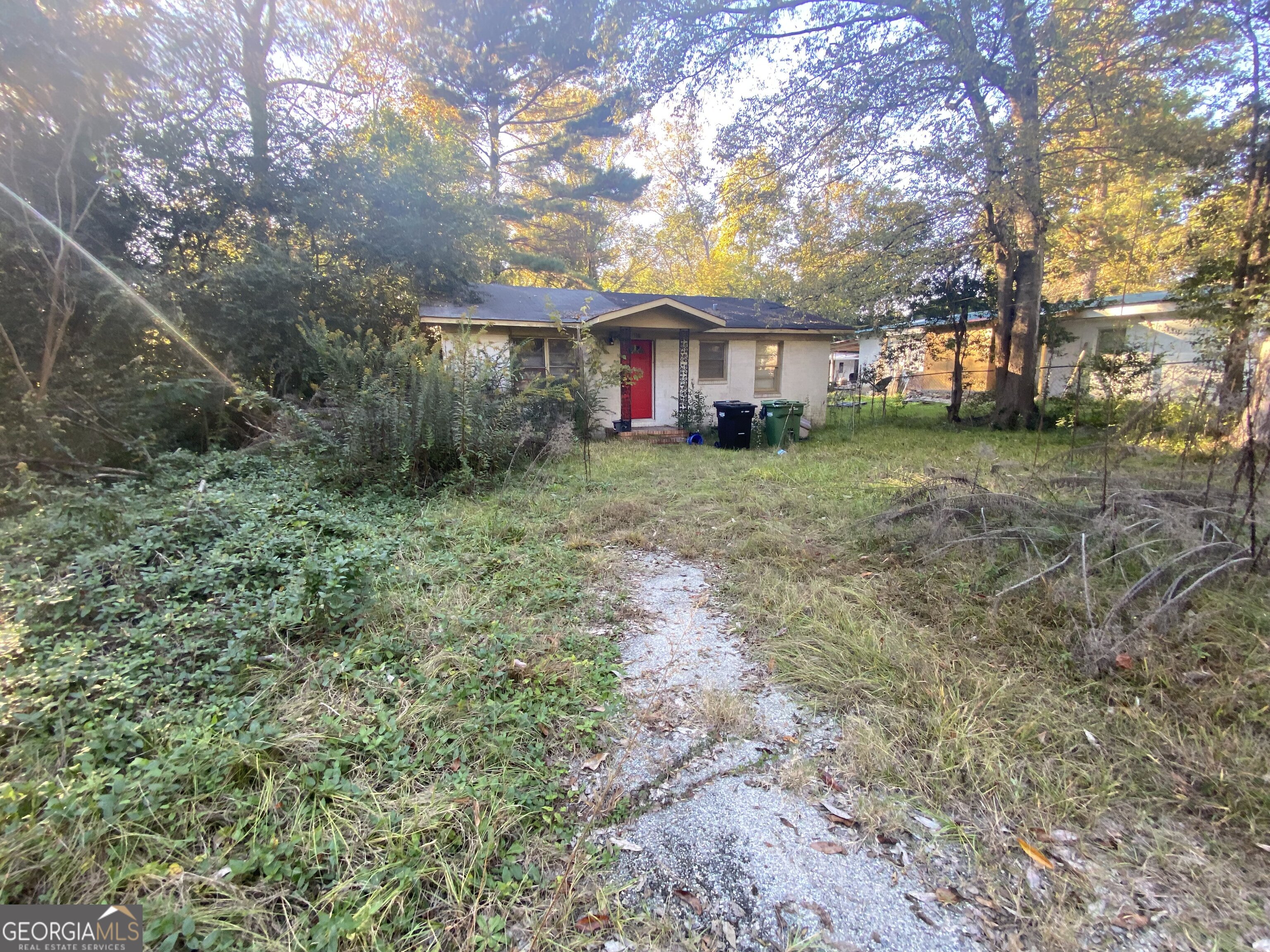 869 Goodson Drive Columbus, GA 31907 - Photo 1 of 9 a view of a house with a yard