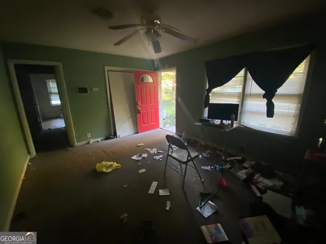 a view of a workspace with furniture