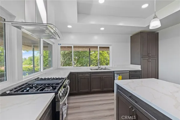 a bathroom with a sink toilet and mirror