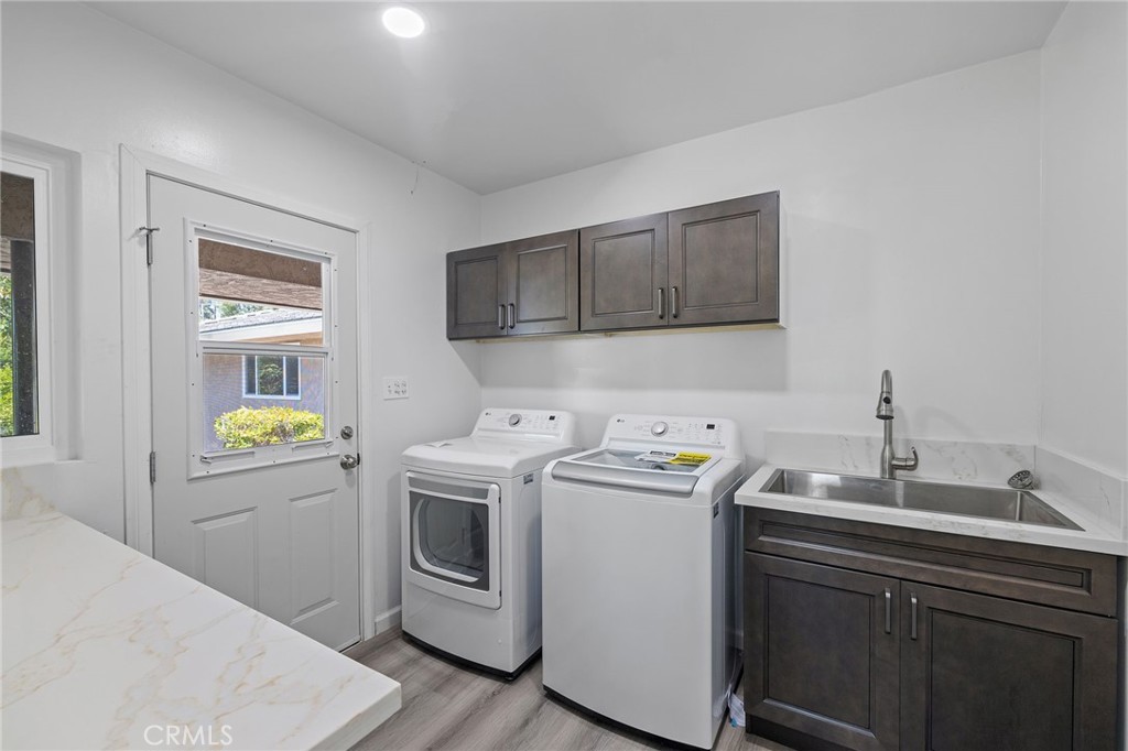 1281 Mayapan Road La Habra Heights, CA 90631 - Photo 24 of 65 a utility room with dryer and washer