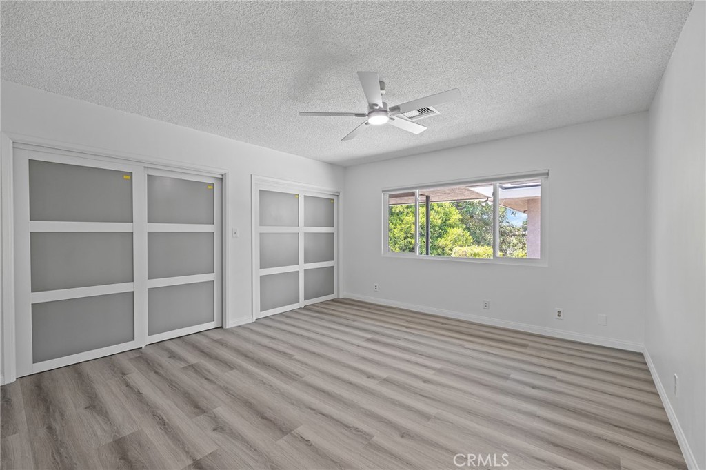 1281 Mayapan Road La Habra Heights, CA 90631 - Photo 29 of 65 a view of an empty room with a window and wooden floor