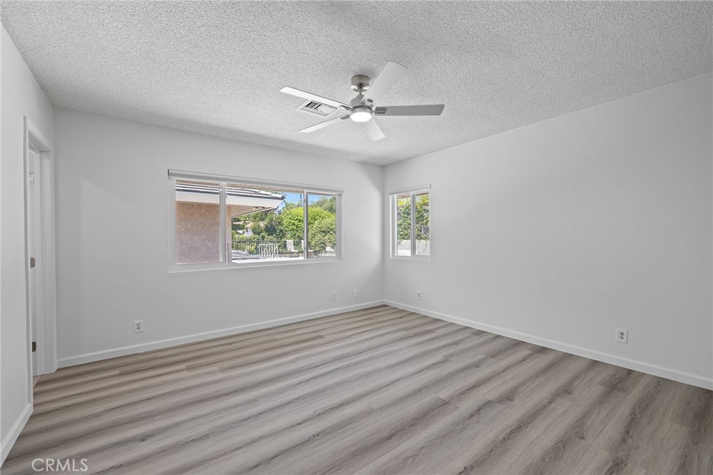 1281 Mayapan Road La Habra Heights, CA 90631 - Photo 33 of 65 wooden floor in an empty room with a window
