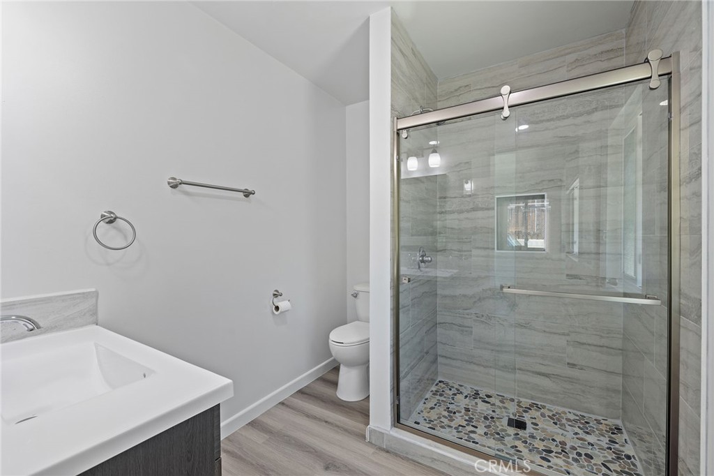 1281 Mayapan Road La Habra Heights, CA 90631 - Photo 35 of 65 a bathroom with a shower and a toilet
