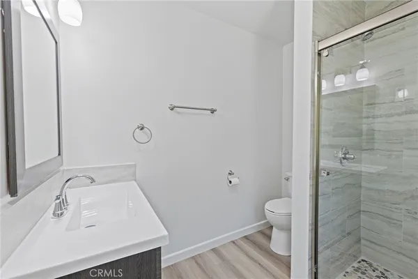 a view of roof deck with a barbeque and wooden stairs
