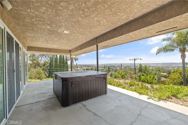 an aerial view of a house with a outdoor space