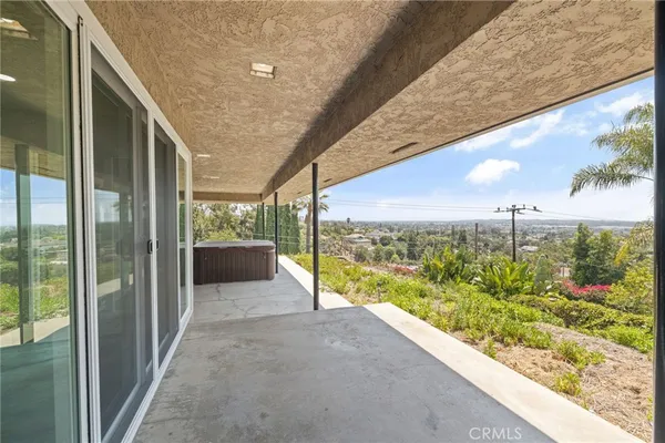 an aerial view of a house with a outdoor space