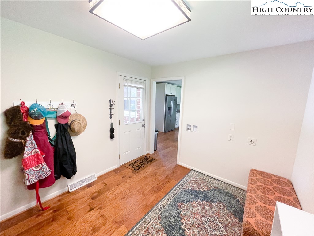 153 Wey Street Boone, NC 28607 - Photo 11 of 41 a bedroom with a bed and a window