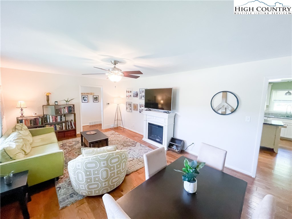 153 Wey Street Boone, NC 28607 - Photo 12 of 41 a living room with furniture fireplace and a flat screen tv