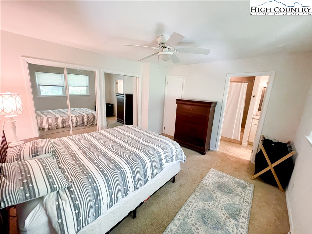 153 Wey Street Boone, NC 28607 - Photo 19 of 41 a bedroom with bed and window