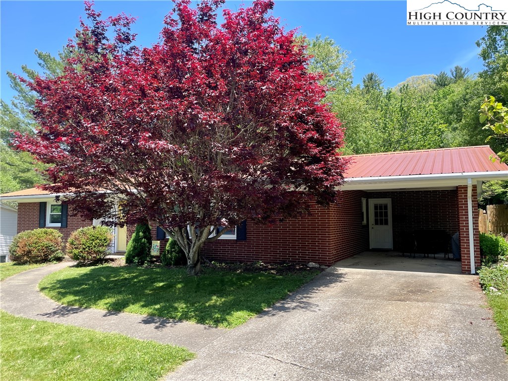 153 Wey Street Boone, NC 28607 - Photo 2 of 41 a view of a house with a yard
