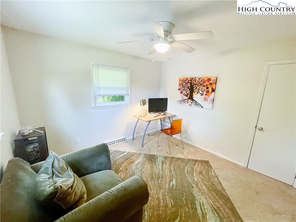 153 Wey Street Boone, NC 28607 - Photo 24 of 41 a living room with furniture and a flat screen tv