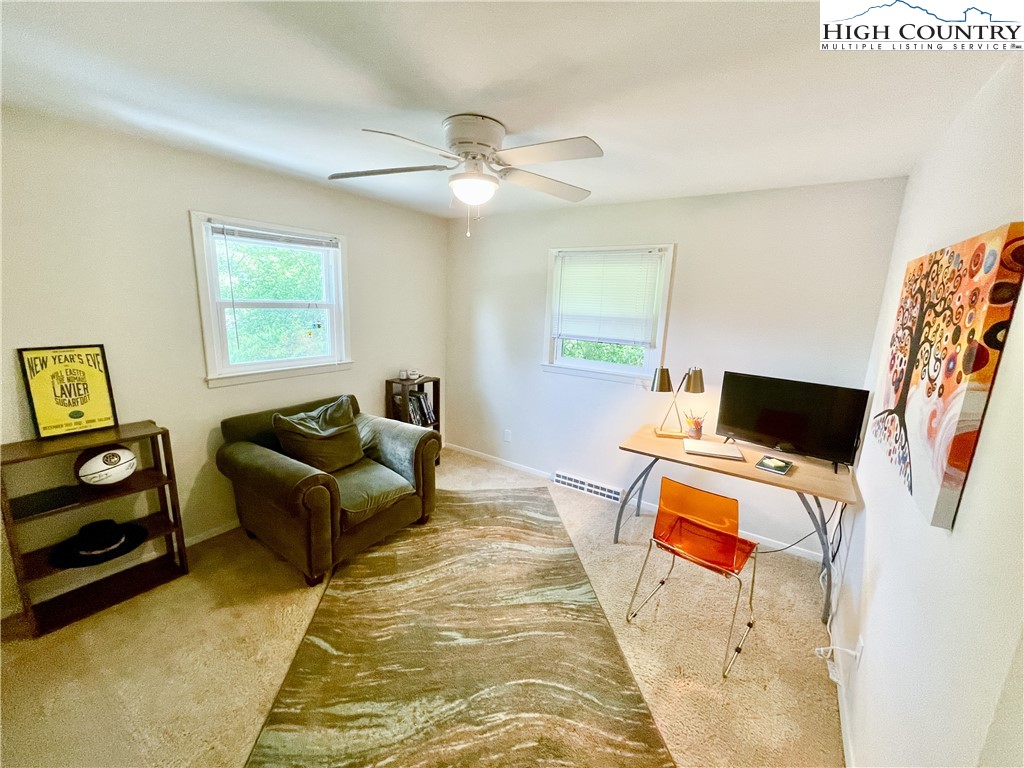 153 Wey Street Boone, NC 28607 - Photo 25 of 41 a living room with furniture and a flat screen tv