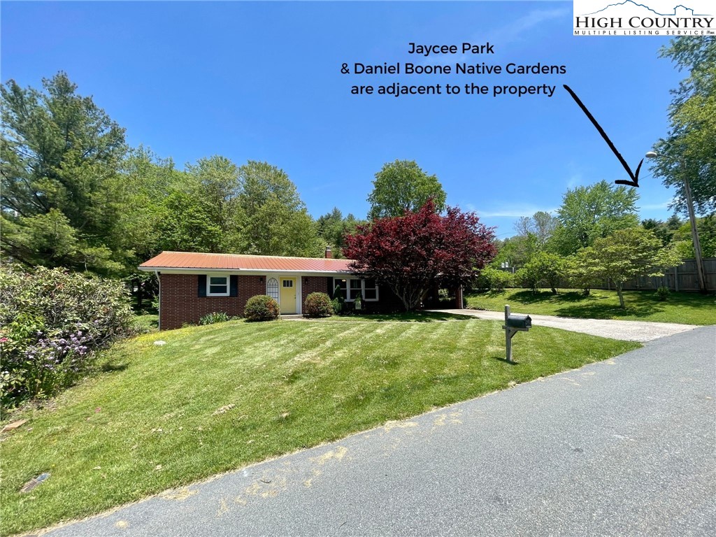 153 Wey Street Boone, NC 28607 - Photo 3 of 41 a front view of a house with yard