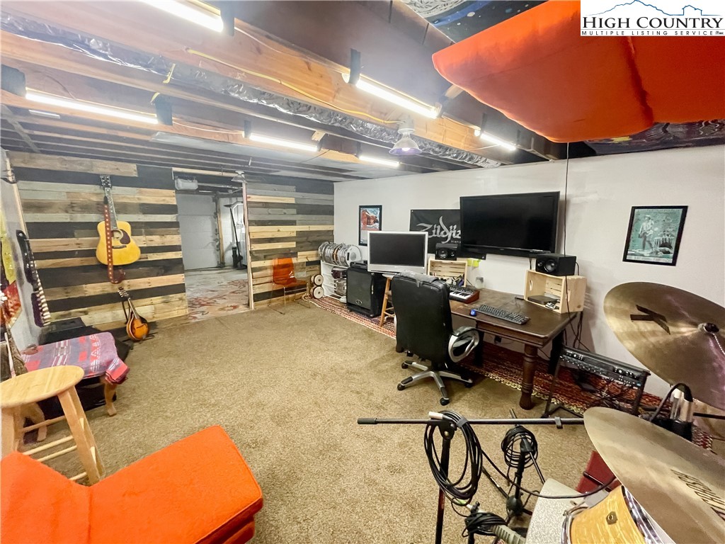 153 Wey Street Boone, NC 28607 - Photo 31 of 41 a view of a workspace with furniture and a window