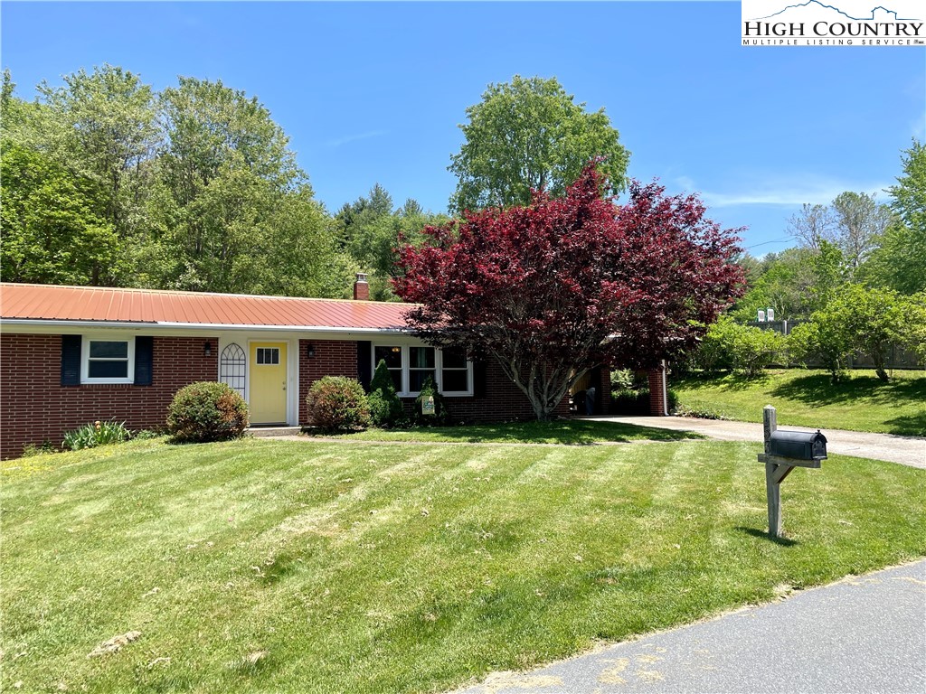 153 Wey Street Boone, NC 28607 - Photo 4 of 41 a view of a house with a yard and tree s