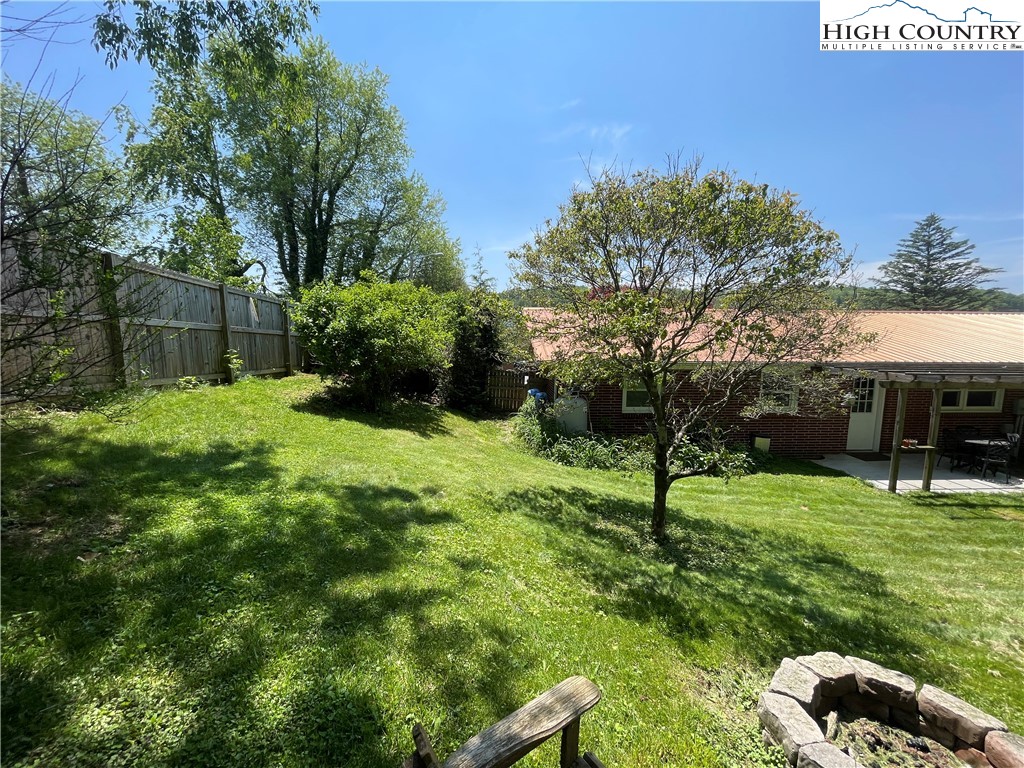 153 Wey Street Boone, NC 28607 - Photo 41 of 41 a view of backyard with a garden and entertaining space