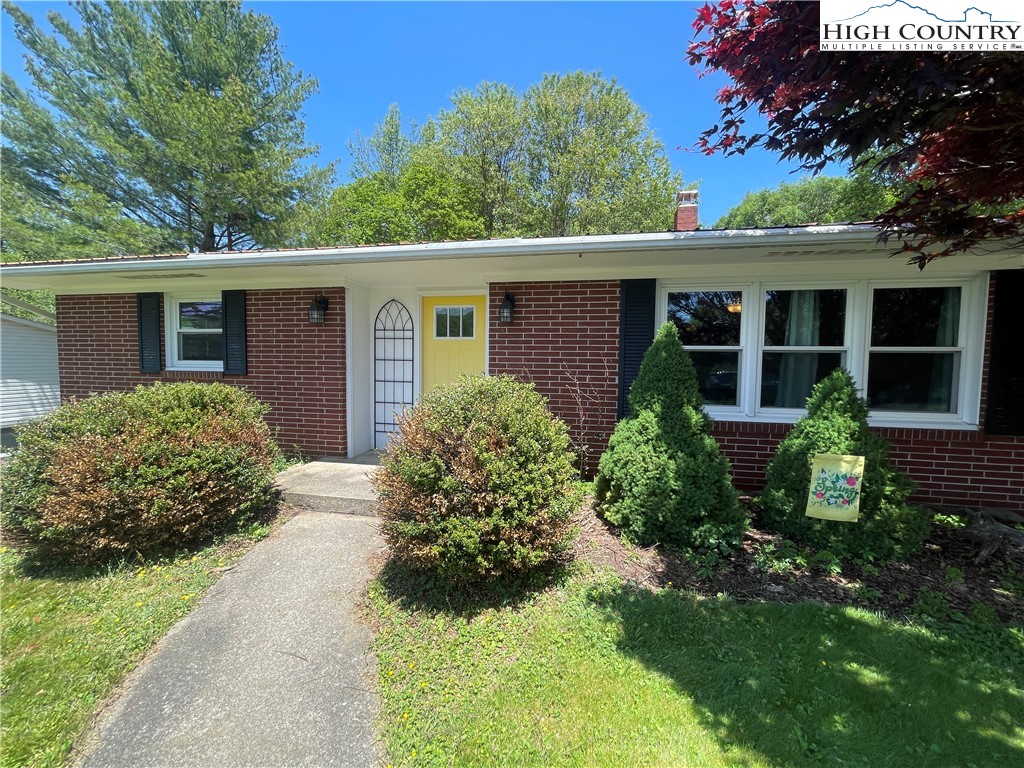 153 Wey Street Boone, NC 28607 - Photo 5 of 41 a front view of a house with garden