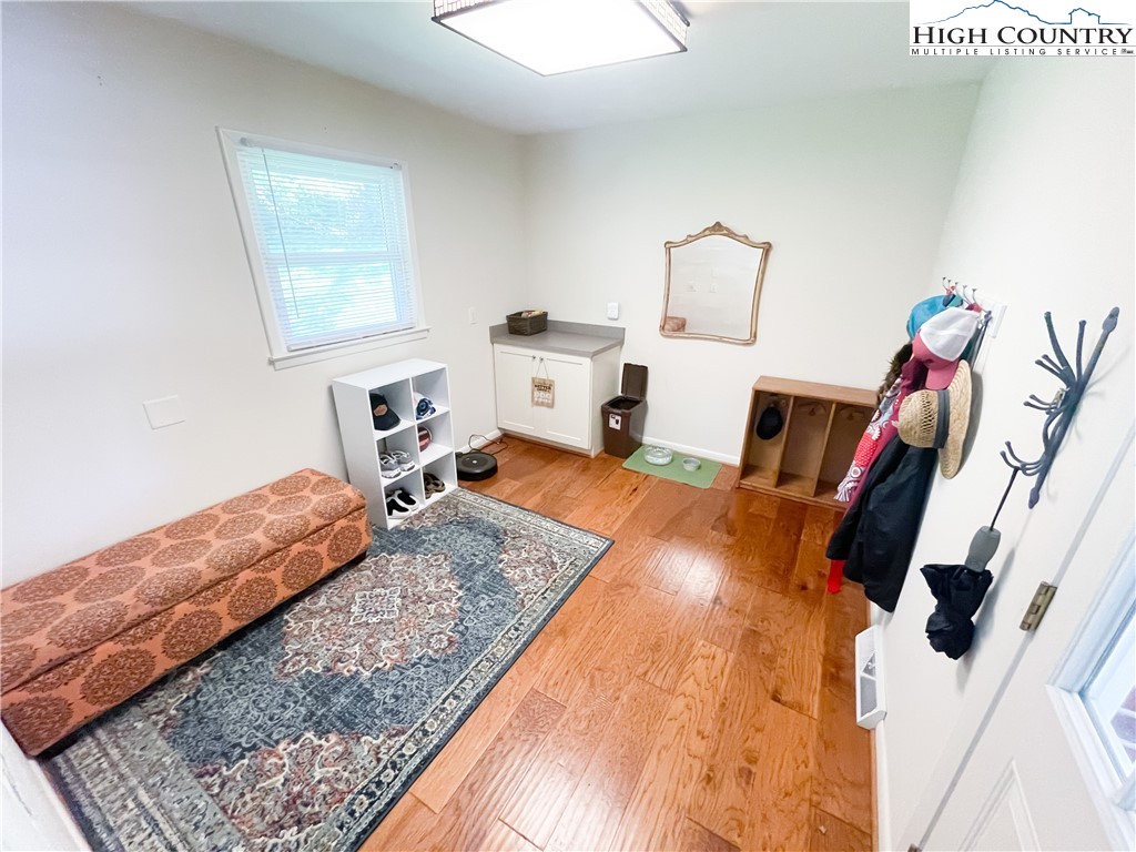 153 Wey Street Boone, NC 28607 - Photo 10 of 41 a living room with furniture and a rug