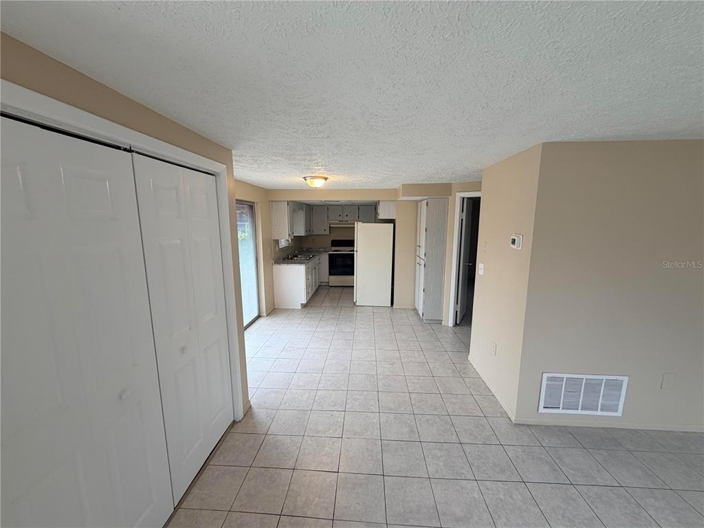 6330 Pennsylvania Avenue New Port Richey, FL 34653 - Photo 5 of 17 a view of empty room with wooden floor