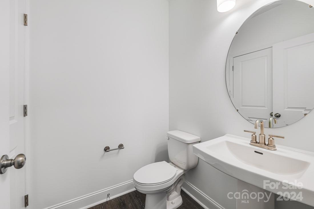1156 Lost Cv Road Indian Land, SC 29707 - Photo 14 of 19 a bathroom with a sink toilet and a mirror