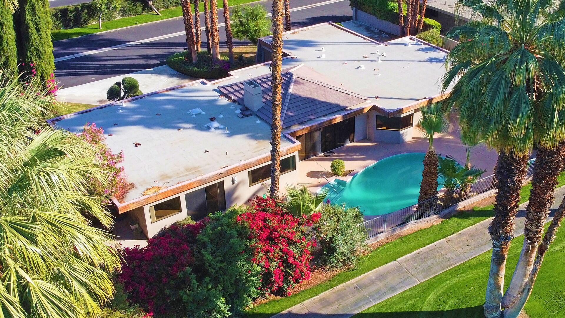 40281 Sand Dune Road Rancho Mirage, CA 92270 - Photo 3 of 41 a view of a backyard with plants