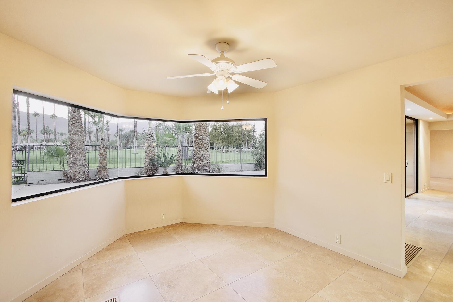 40281 Sand Dune Road Rancho Mirage, CA 92270 - Photo 21 of 41 an empty room with a window