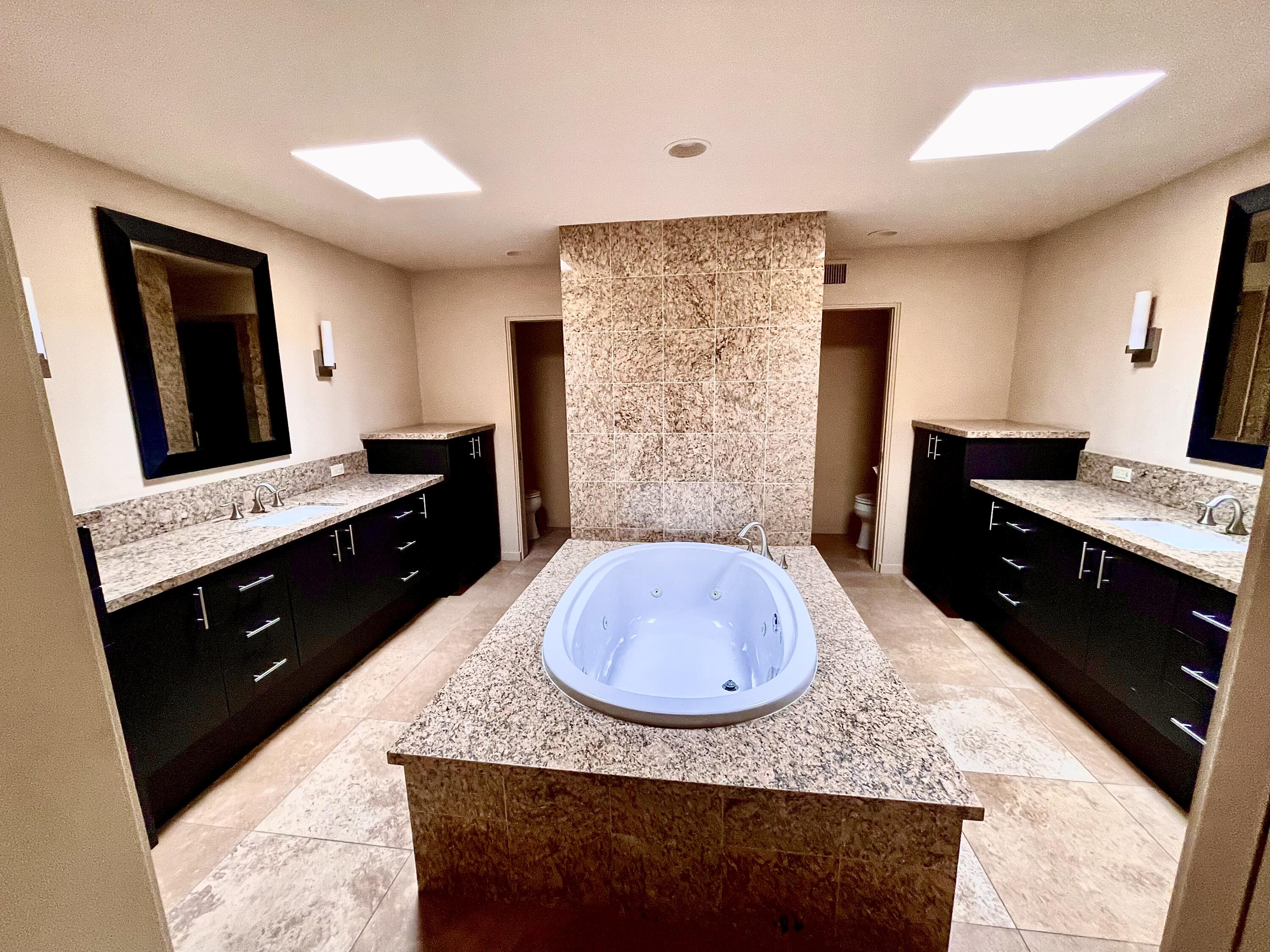 40281 Sand Dune Road Rancho Mirage, CA 92270 - Photo 24 of 41 a kitchen with sink stove and refrigerator