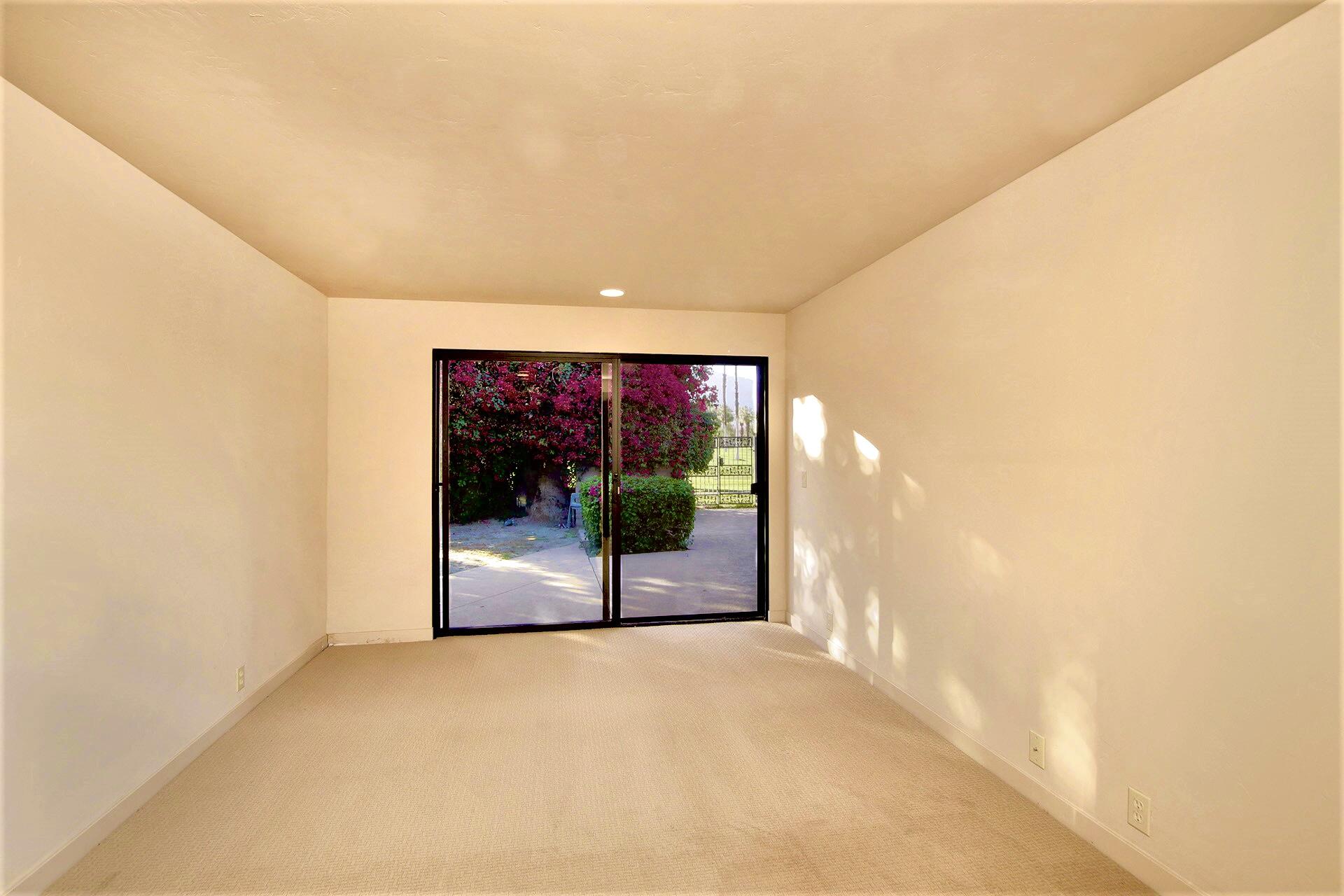 40281 Sand Dune Road Rancho Mirage, CA 92270 - Photo 29 of 41 a view of a hallway with a room
