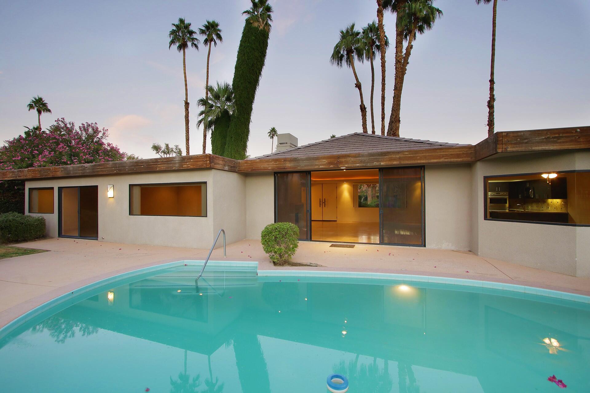 40281 Sand Dune Road Rancho Mirage, CA 92270 - Photo 35 of 41 a front view of a house with garden