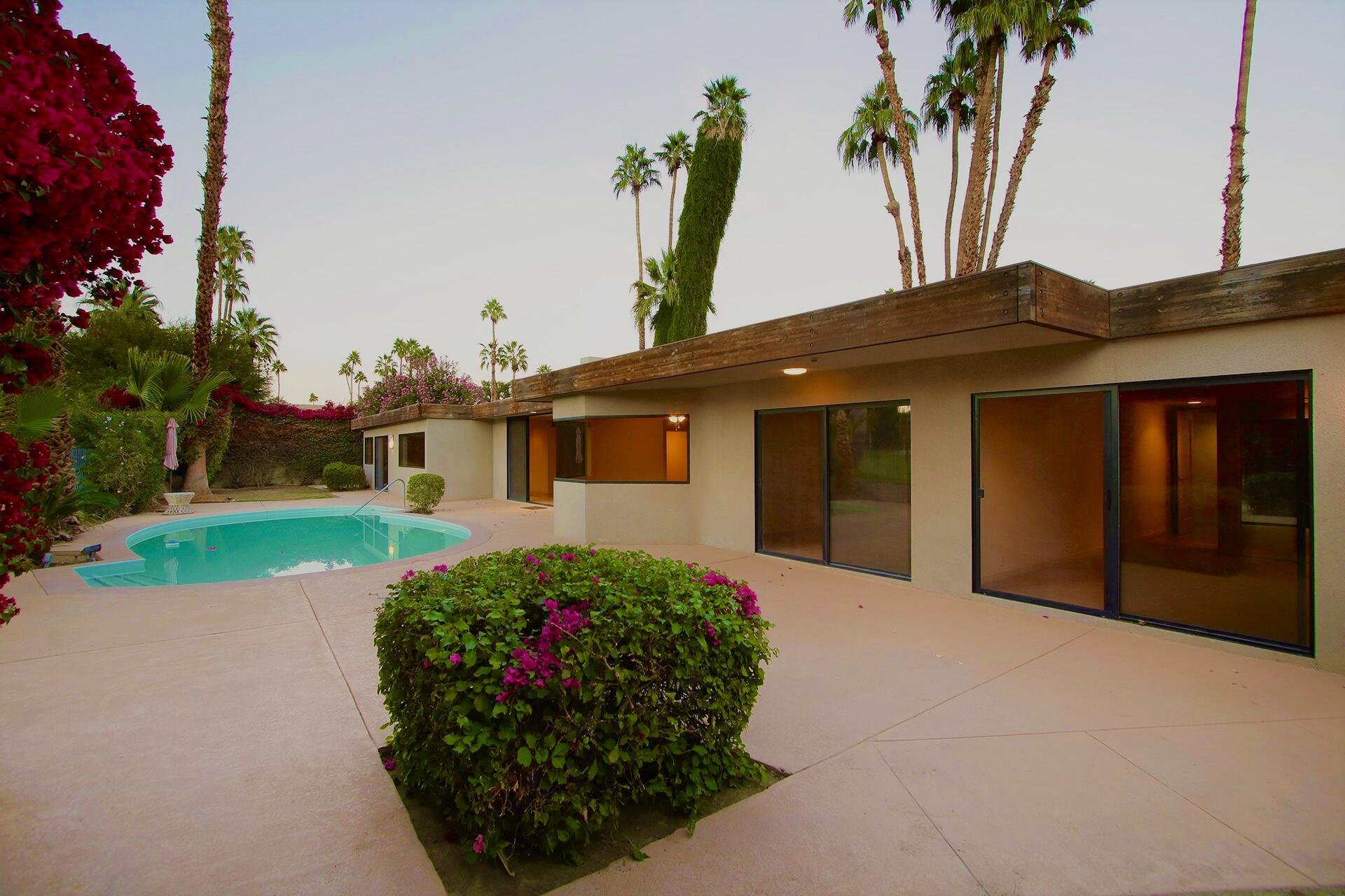 40281 Sand Dune Road Rancho Mirage, CA 92270 - Photo 36 of 41 a front view of a house with garden