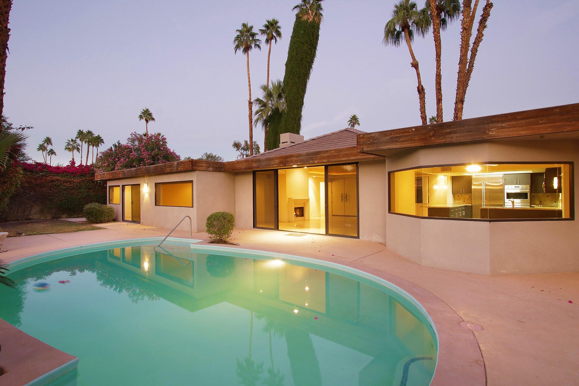 40281 Sand Dune Road Rancho Mirage, CA 92270 - Photo 38 of 41 a front view of a house with yard