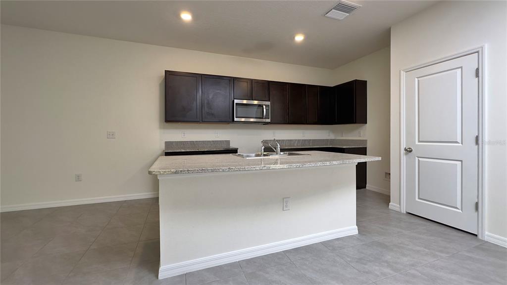 1570 Hubbell Road Wesley Chapel, FL 33543 - Photo 5 of 23