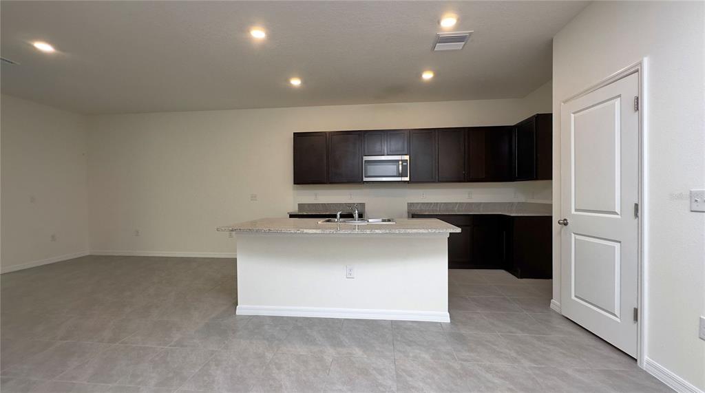 1570 Hubbell Road Wesley Chapel, FL 33543 - Photo 6 of 23