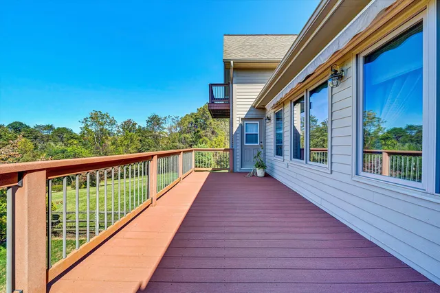 a spacious bathroom with a bathtub and shower