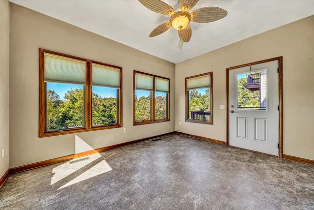 a view of a workspace with furniture