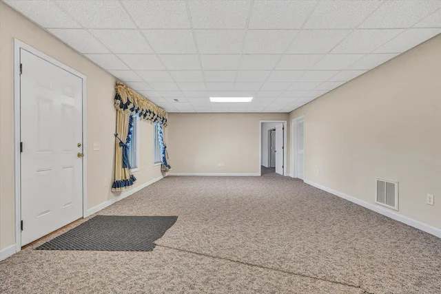 a view of a garden with houses