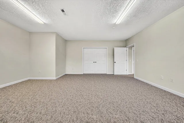 a view of a lake with mountains in the background