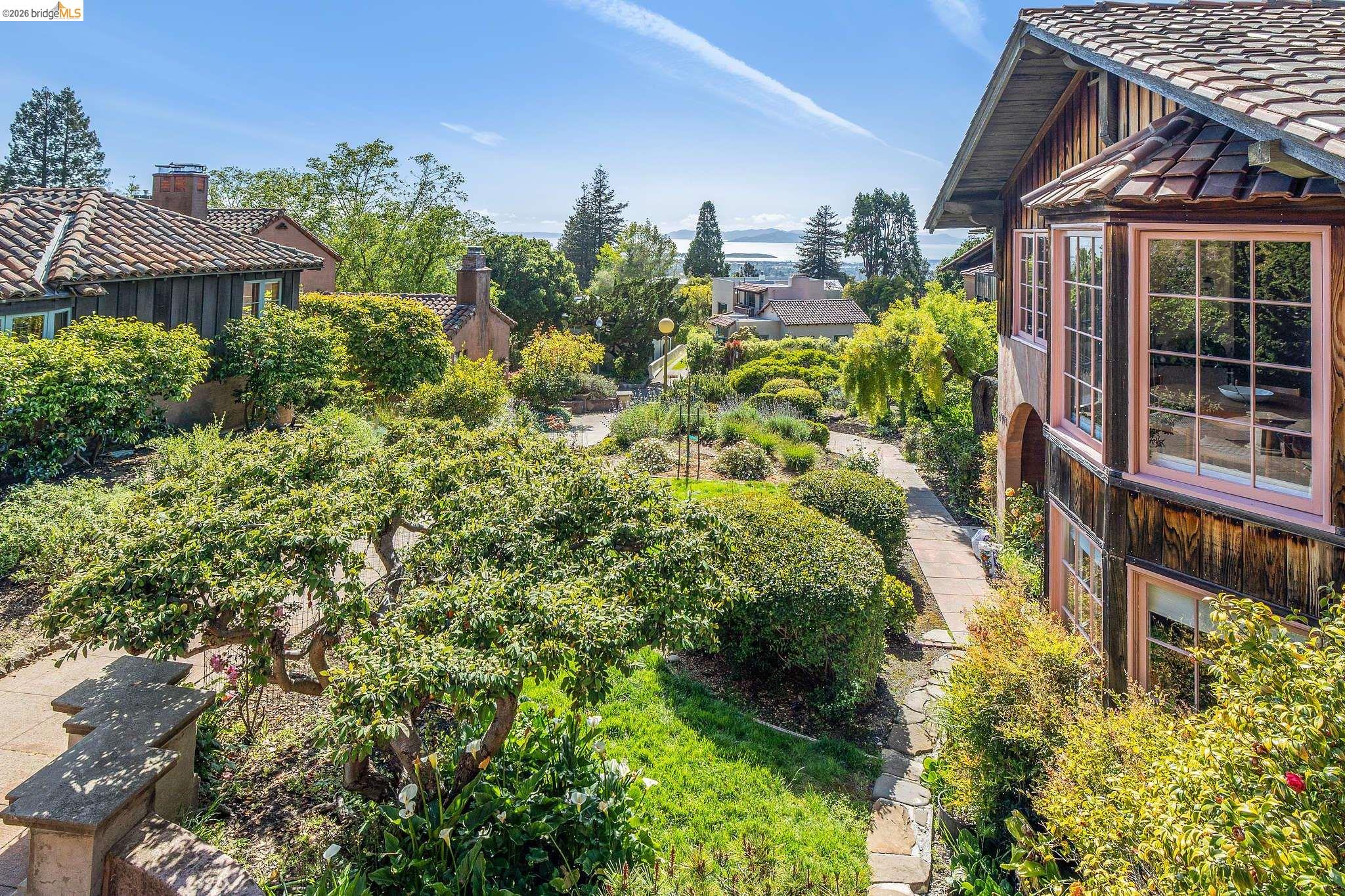 2501 Rose Walk Berkeley, CA 94708 - Photo 9 of 60 a view of a house with a yard and garden