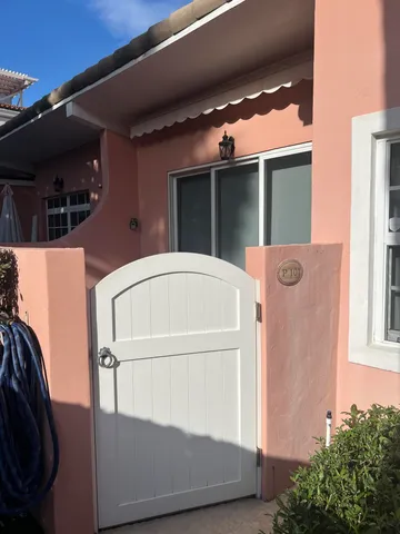 view of house with parking space