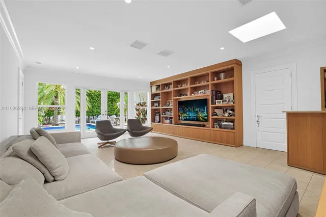 a view of livingroom with furniture and empty room
