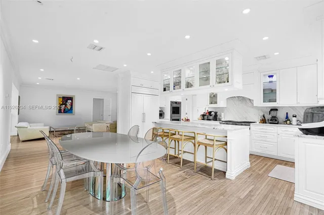 a view of swimming pool with chairs