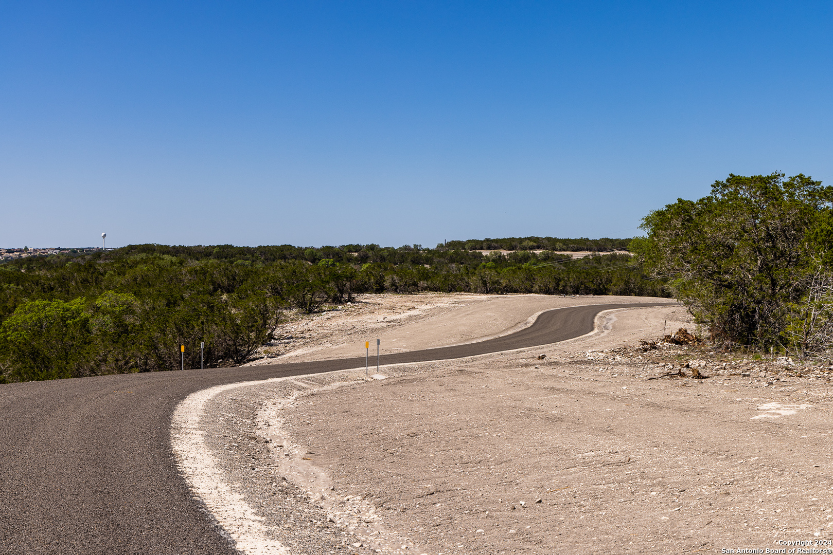 174 Countless Views Dr N Kerrville, TX 78028 - Photo 3 of 10 a view of a dry yard with a lake view