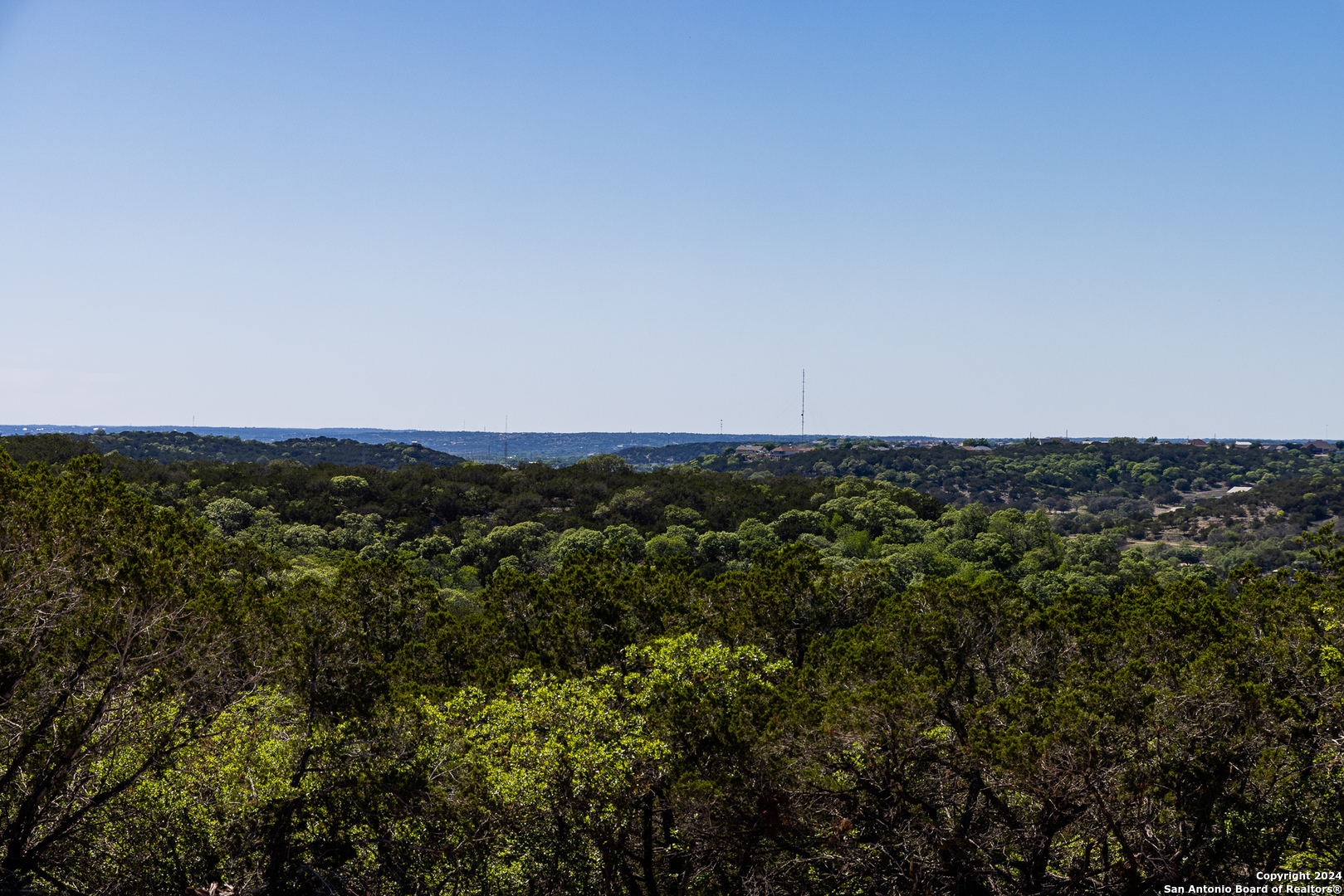 174 Countless Views Dr N Kerrville, TX 78028 - Photo 7 of 10 a view of a large building