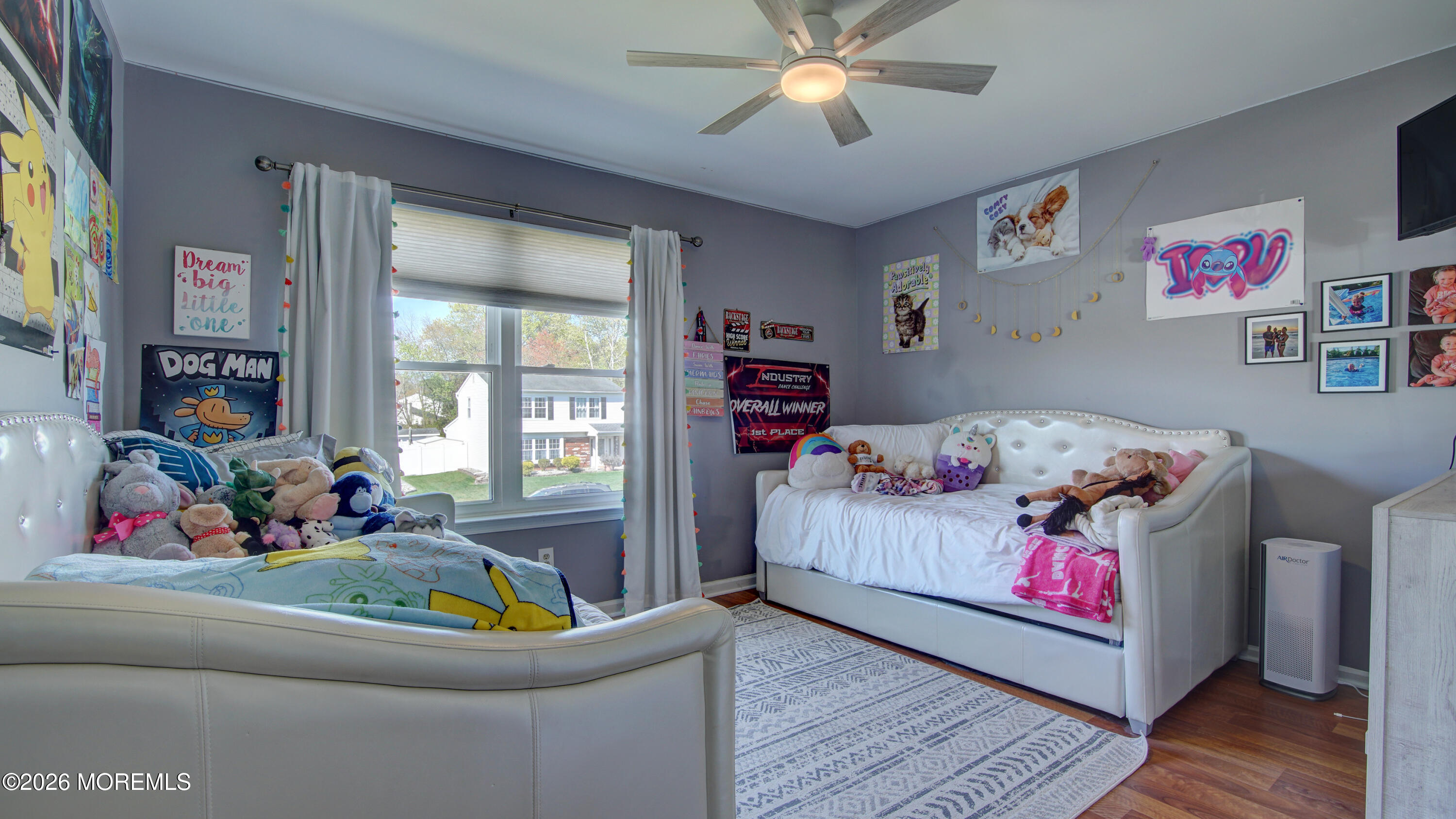 128 Starlight Road Howell, NJ 07731 - Photo 16 of 36 a living room with baby toys