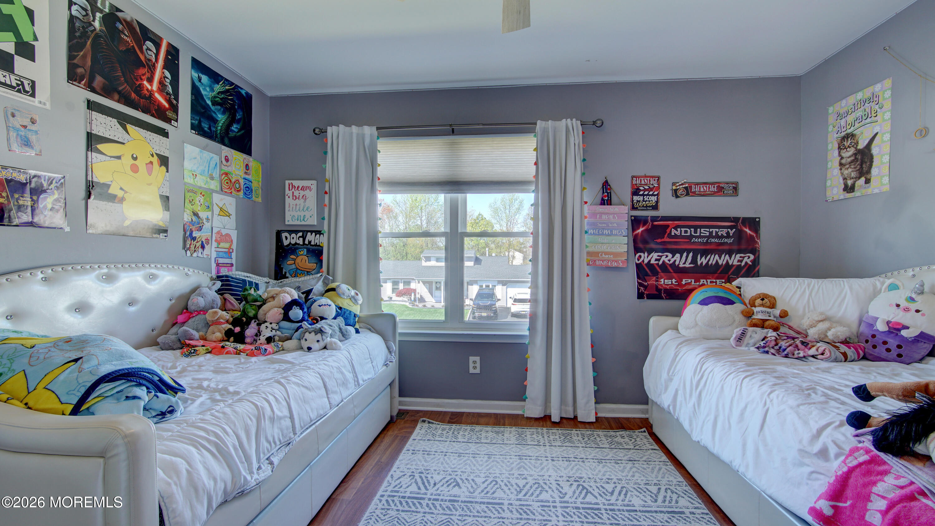 128 Starlight Road Howell, NJ 07731 - Photo 17 of 36 a bedroom with a bed and wooden floor